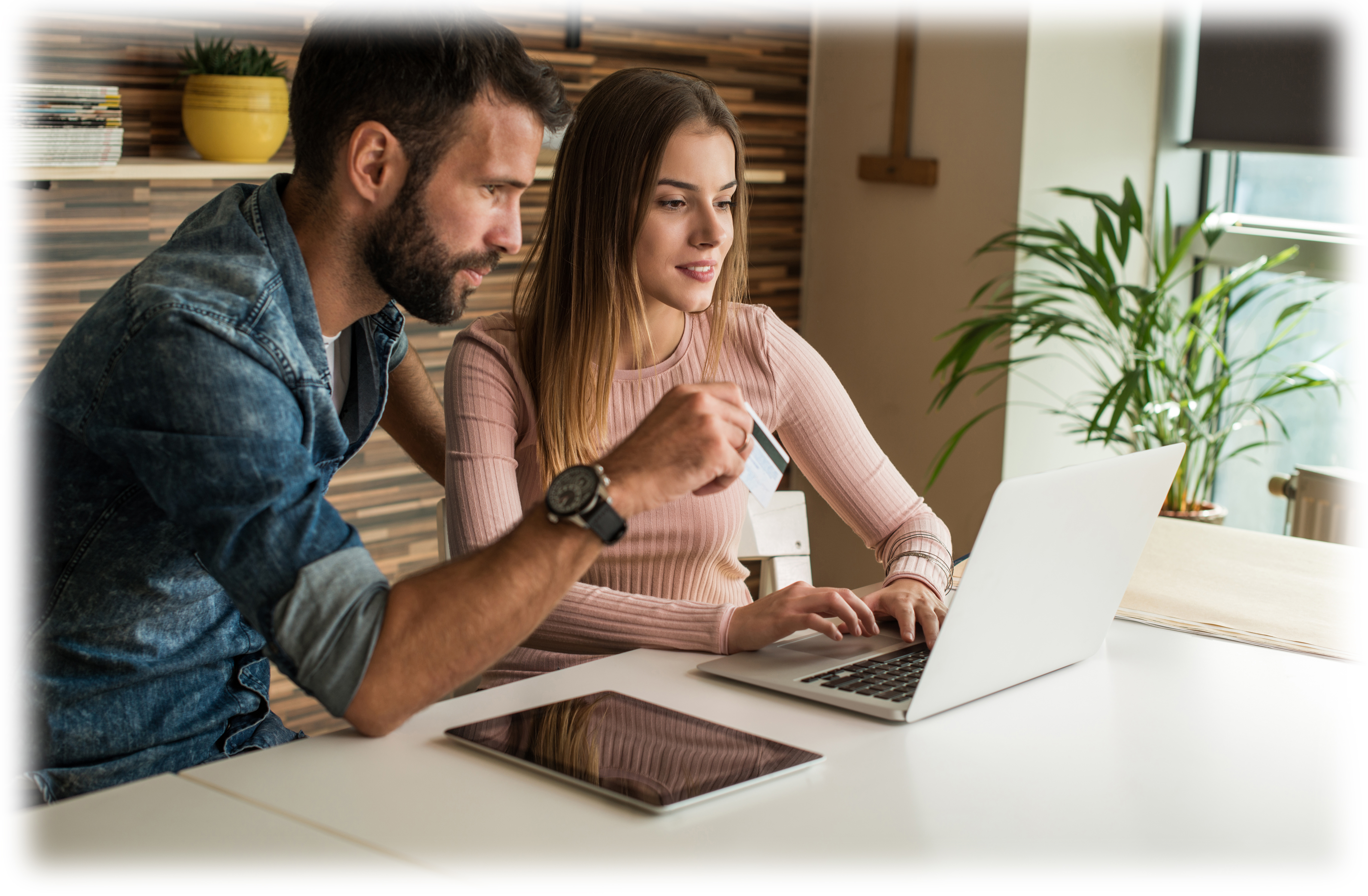 photo of couple on computer